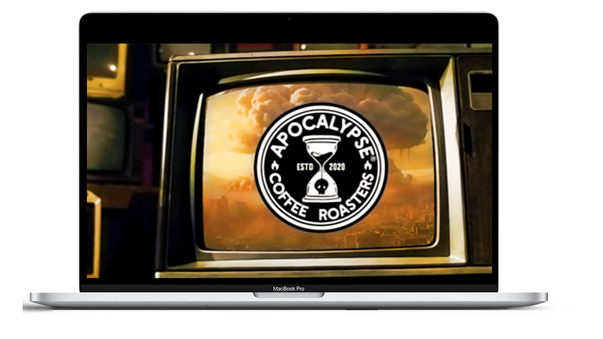 Coffee roasters logo displayed on vintage TV screen with sunset background.